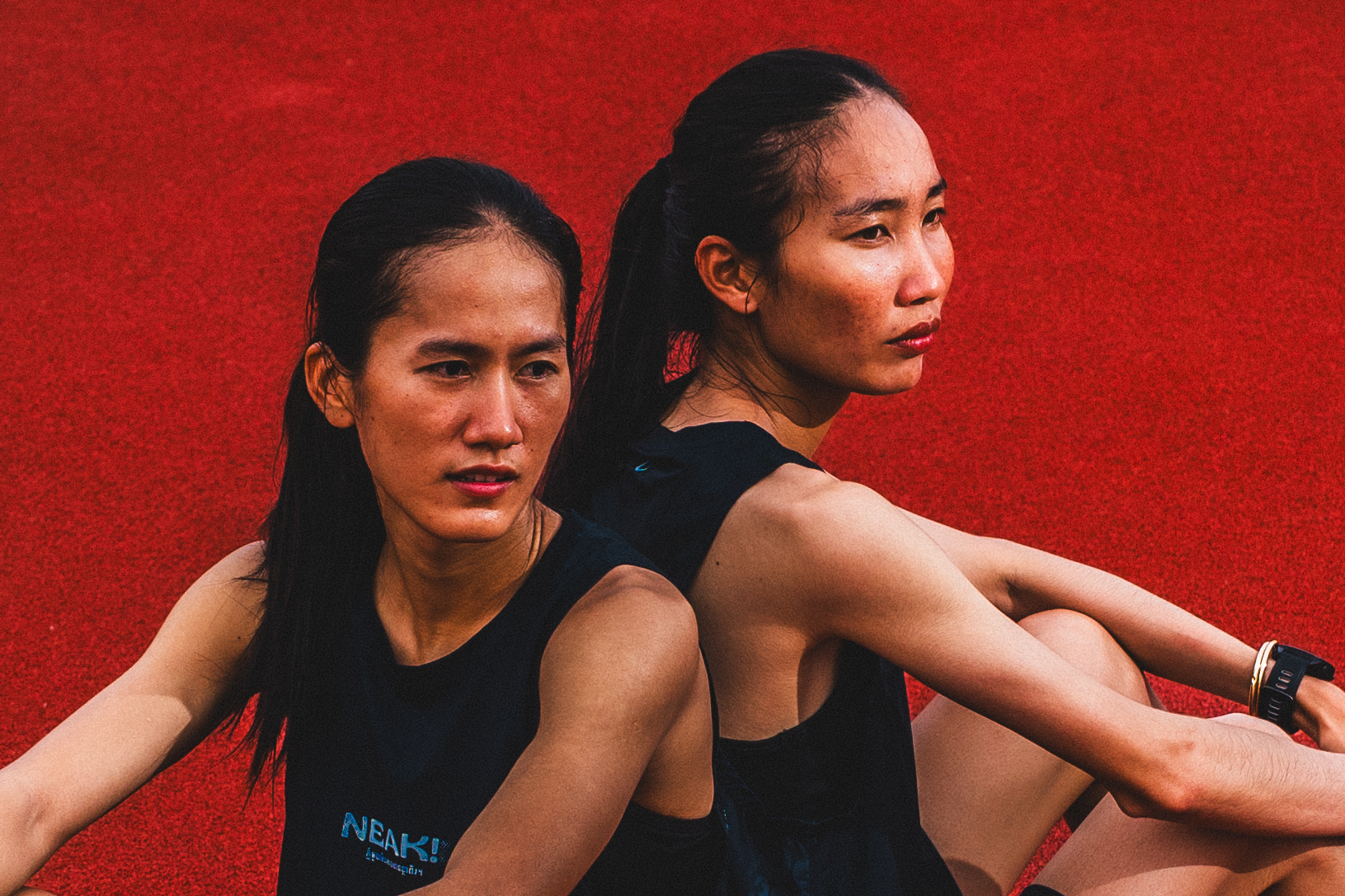 Two runners in Black Dragon kit