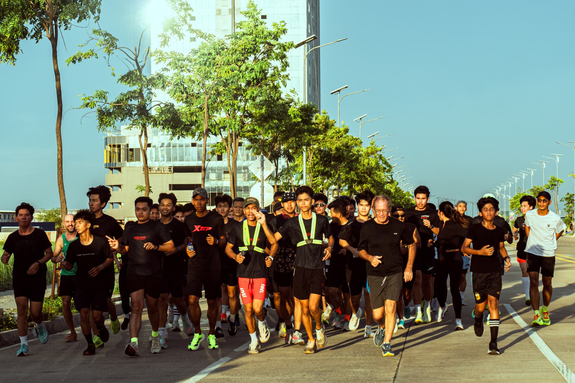 NEAK runners moving together through Phnom Penh