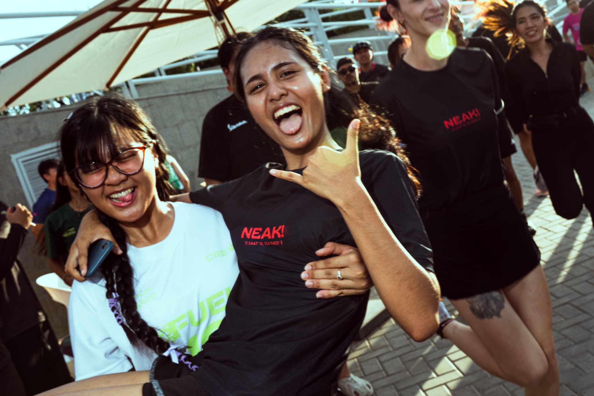 Members of the NEAK community running side by side